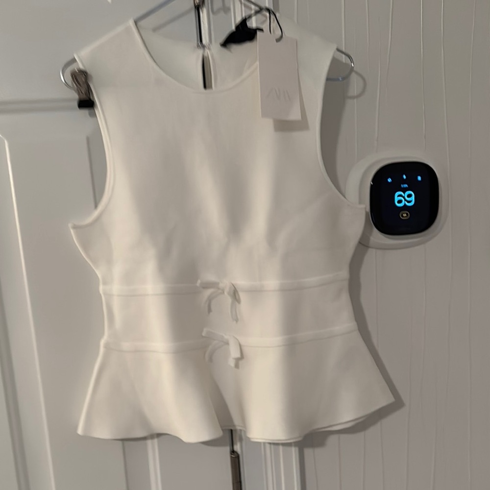 Zara White Peplum Sleeveless top.
